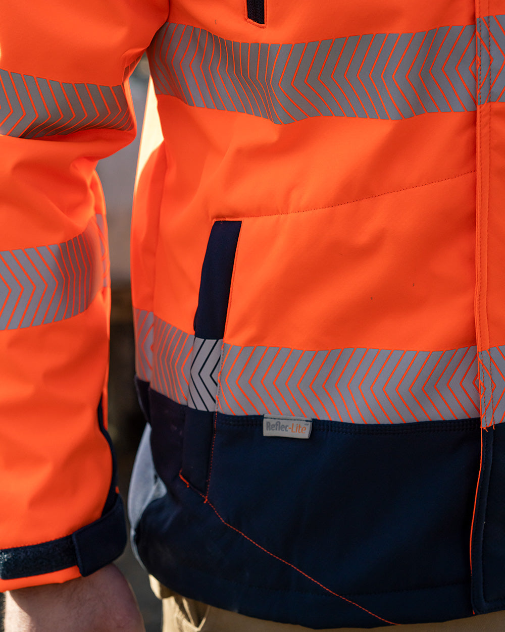 Jones Hi-Vis Softshell Coat in Fluoro Orange & Navy