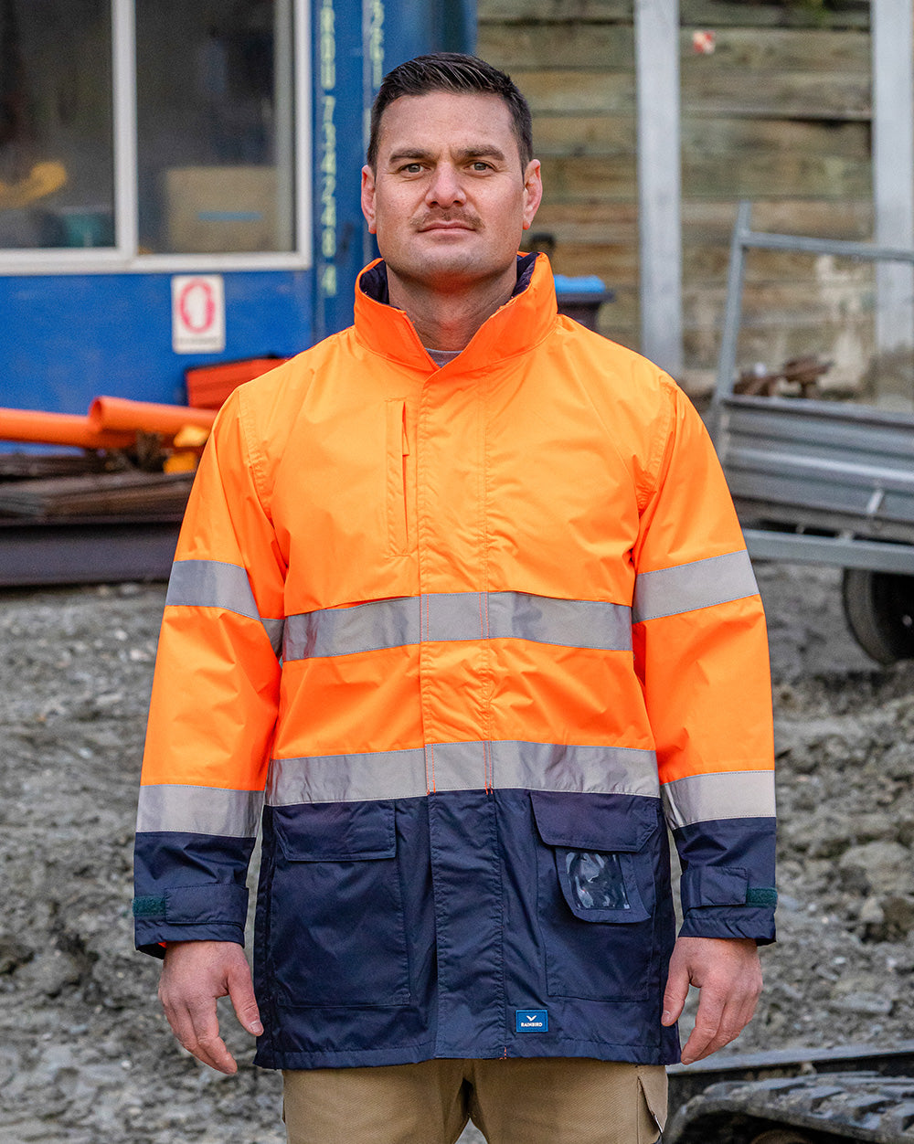 Northern Jacket in Fluoro Orange & Navy