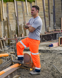 Shelter Pant in Fluoro Orange & Navy
